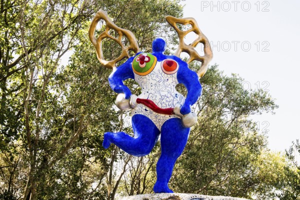 Colourful sculpture, Giardino dei Tarocchi, Tarot Garden, by Niki de Saint Phalle, near Capalbio, Grosseto Province, Tuscany, Italy