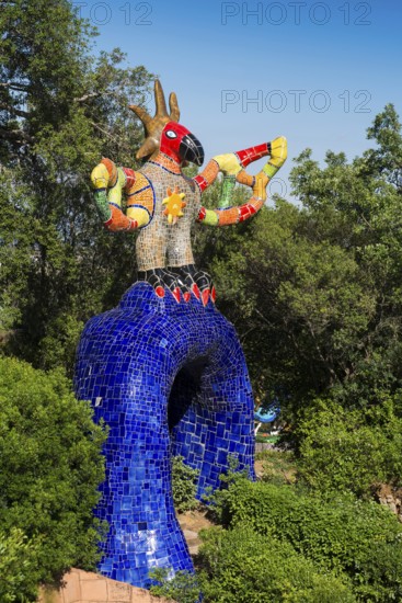 Colourful sculptures made of glass and mirrors, Giardino dei Tarocchi, Garden of Tarot, by Niki de Saint Phalle, near Capalbio, Province of Grosseto, Tuscany, Italy