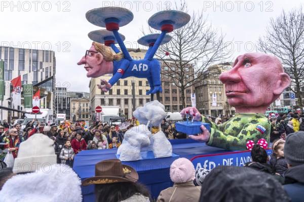 Rose Monday procession in Düsseldorf, theme car by wagon manufacturer Jacques Tilly, theme Putin steers the AFD as a drone, with the face of AFD party leader Alice Weidel, proximity to Russia, influenced by state propaganda, North Rhine-Westphalia, Germany