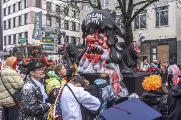 Rose Monday procession in Düsseldorf, theme car by wagon manufacturer Jacques Tilly, topic of mass protests in Iran against the Iranian mullah regime, the government is slowly melting away, North Rhine-Westphalia, Germany