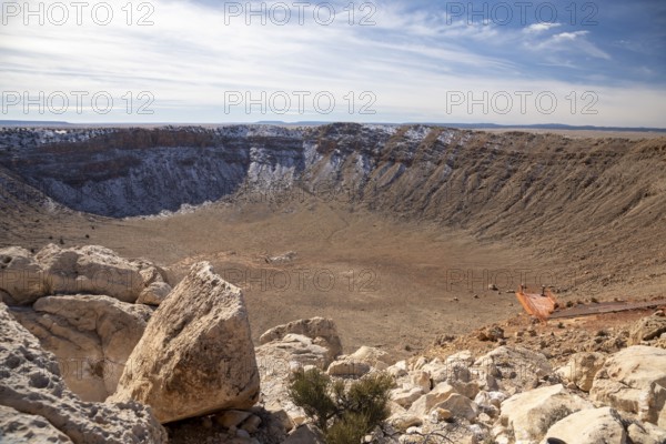 Winslow, Arizona - Meteor Crater. The crater was formed about 50, 000 years ago. It is 560 feet deep and abouat three-quarters of a mile in diameter. It is now a major tourist attraction