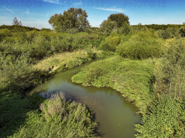 Datteln, North Rhine-Westphalia, Germany - Renatured Dattelner Mühlenbach just in front of flowing into the Lippe at the KLA Dattelner Mühlenbach sewage treatment plant
