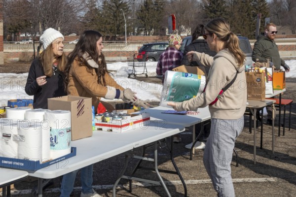 Oak Park, Michigan USA - 14 February 2026 - Volunteers collect food and other items for immigrants threatened by ICE. The Valentine's Day collection was called Love Without Borders: Valentine Care for Immigrant Neighbors