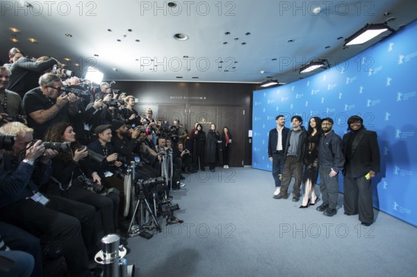 Aidan Zamiri (director), Charli xcx (Charlotte Emma Aitchison, singer) and David Hinojosa (producer) opposite press photographers at a photocall for the film The Moment at the Berlinale at the Hyatt Hotel Berlin Berlin on 14.02.2026. The 76th Berlin International Film Festival will take place from 12 to 22 February 2026