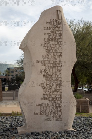 Phoenix, Arizona - The Fifth Amendment in the Bill of Rights Monument in Wesley Bolin Memorial Plaza at the Arizona State Capitol complex. Each of the 10 stones carries the text of one of the first ten Constitutional amendments