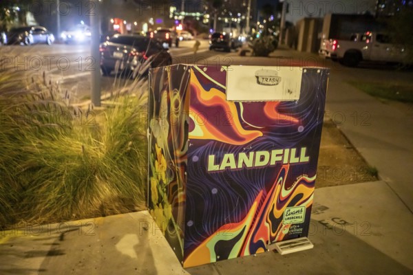 Phoenix, Arizona - A trash container in downtown Phoenix is marked 'landfill' to indicate that the contents will not be recycled. or composted