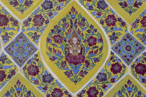 Coloured Bencharong ceramic tiles, depiction of Thai angels (devas) in diamond-shaped frames, circular gallery (Phra Rabieng) around the central chedi, Wat Ratchabophit (full name Wat Ratchabophit Sathit-Mahasimaram Ratcha Wora Maha Viharn), Buddhist temple, Wat, Phra Nakhon district, Bangkok, Thailand