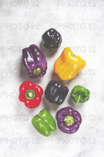 Assortment, of colorful bell peppers, on a light background, top view, no people