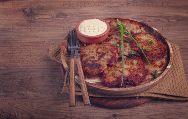 Potato pancakes, pancakes with sour cream, Belarusian dish, homemade, no people