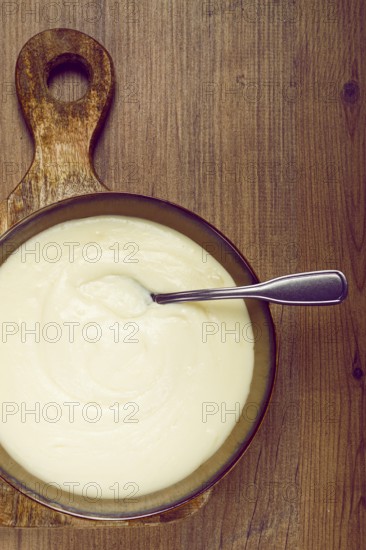 Mashed potatoes, with suluguni cheese, homemade, on a wooden table, no people, top view