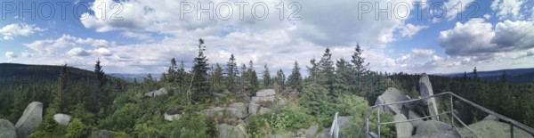 Panorama from Nusshardt over wooded area with views of rocks and sky, Franconian mountain trail, hiking in the Fichtelgebirge nature park Park