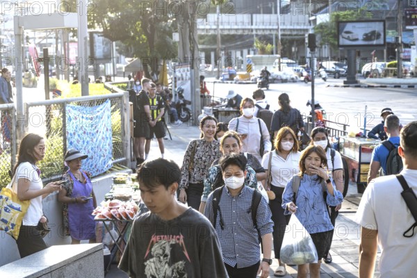 Bangkok, Thailand. March 25th 2025. Thai commuters enter and exit the Lumpini Metro station in the Sathon district of central downtown Bangkok, Thailand