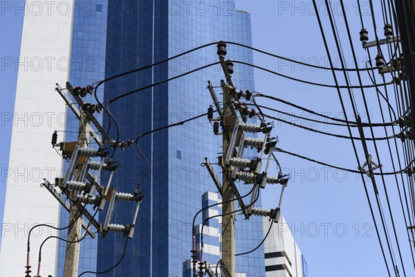 Electricity power distribution lines connecting electric substations and consumers in the Thai capital, Bangkok, Thailand