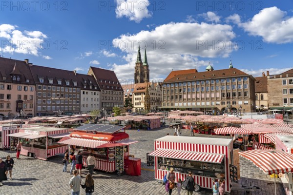 Market stalls on the main market and St. Sebaldus Church in Nuremberg, Bavaria, Germany
