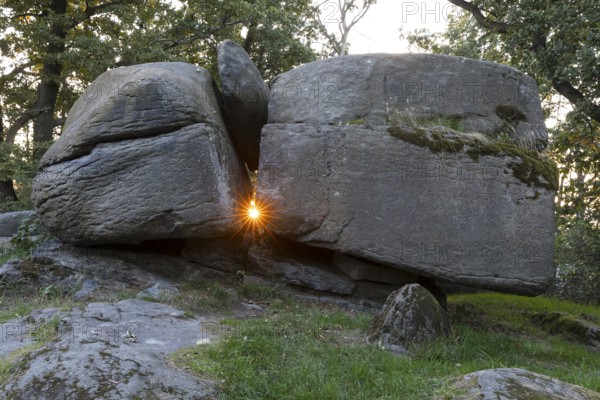 Sun shines through a small gap on the equinox at Teufelsstein Pließkowitz, Sun Shrines of Upper Lusatia, Bautzen, Upper Lusatia, Saxony, Germany
