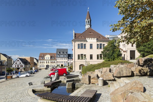 Mining fountain and town hall on the old market in Hohenstein-Ernstthal, Saxony, Germany