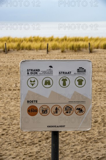 Winter break, on the Zeedijk-Knokke, beach promenade in Knokke-Heist, commandment sign, prohibition sign, for the dress code on the North Sea beach and in the city, dreary winter day, Belgium