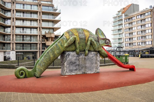 Art in Knokke-Heist, chameleon, tongue as a slide, by Jeremy Deller, part of the Beaufort Triennial, many permanent works of art in public spaces are spread around the city, dreary winter day, Belgium