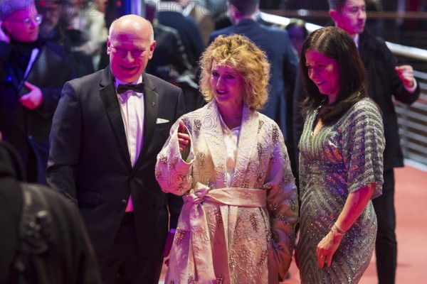 Kai Wegner (Governing Mayor of Berlin, CDU) with partner Katharina Günther-Wünsch (Senator for Education, Youth and Family of the State of Berlin, CDU) and Tricia Tuttle (Artistic Director of the Berlinale) at the opening of the Berlinale at the Theater am Potsdamer Platz in Berlin on 12.02.2026. The 76th Berlin International Film Festival will take place from 12 to 22 February 2026