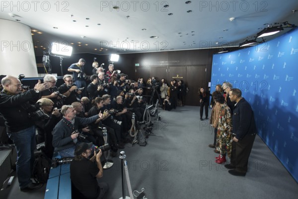 The Berlinale jury members (from left to right) Shivendra Singh Dungarpur, Ewa Puszczynska, Bae Doona, Wim Wenders (jury president), Min Bahadur Bham, Hikari and Reinaldo Marcus Green stand opposite press photographers during a photocall at the Berlinale in Berlin on 12 February 2026. The 76th Berlin International Film Festival will take place from 12 to 22 February 2026