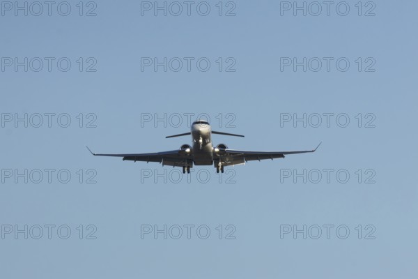 Gulfstream executive business jet aircraft in flight on approach to land at London Stansted airport, Essex, England, United Kingdom