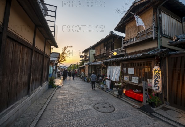 Historic street in the old town with traditional Japanese houses, evening mood, sunset, Higashiyama, Kyoto, Japan