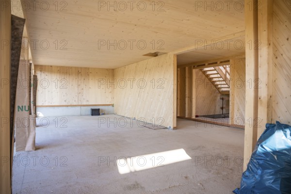 Empty interior of a timber house under construction with visible wooden walls, timber house construction, Gechingen, Germany