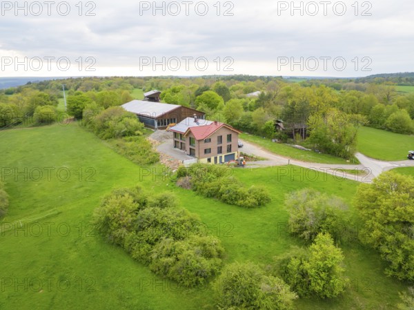 Farm in green surroundings with views of fields and forests, timber house construction, Gechingen, Germany