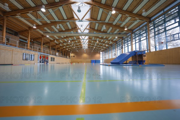 Modern sports hall with wooden roof, bright floor and large climbing frame, Schlehengäu sports hall Gechingen, Calw district, Germany