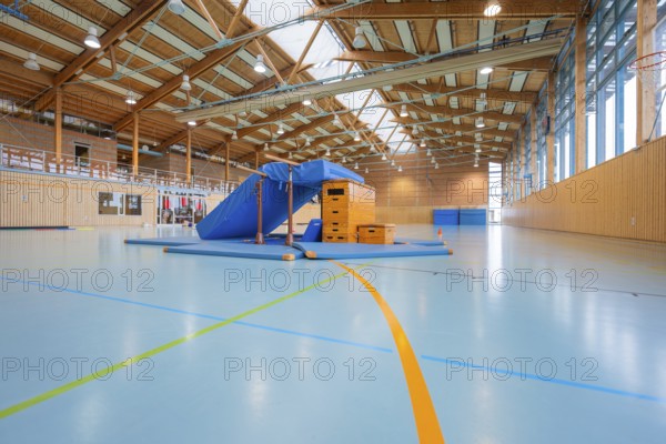 Empty sports hall with equipment available and a window front that illuminates the room, Schlehengäu sports hall Gechingen, Calw district, Germany