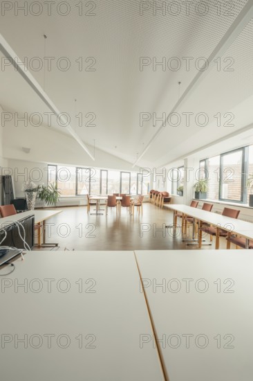 Spacious conference room with long tables and large windows, Gechingen Town Hall, Calw District, Germany