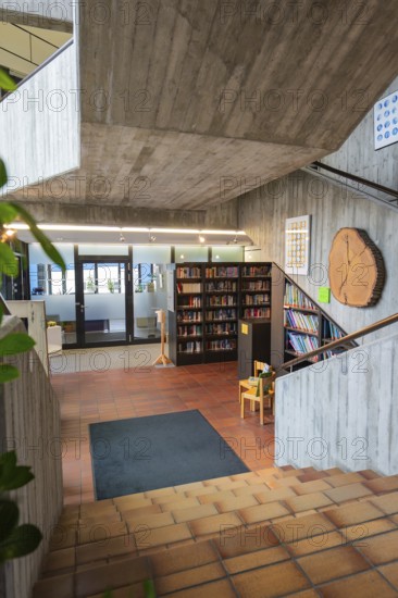 Modern staircase with library and wooden elements, Gechingen Town Hall, Calw district, Germany