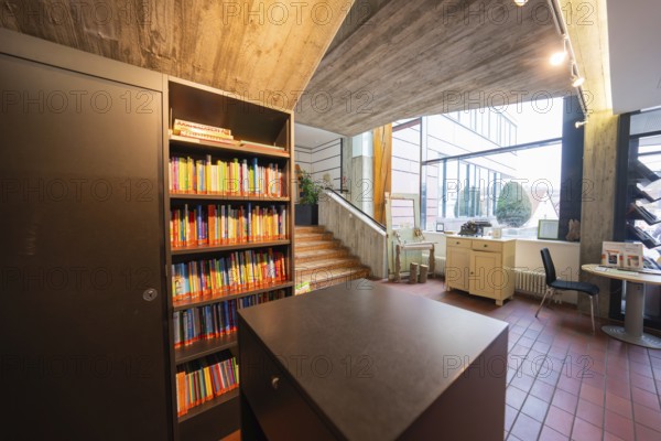 Modern interior design with bookshelves and large windows, Gechingen Town Hall, Calw district, Germany