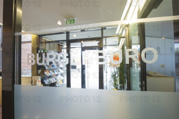 Glass panel with the inscription Bürgerbüro, modern entrance area with light incidence, Gechingen Town Hall, Calw district, Germany