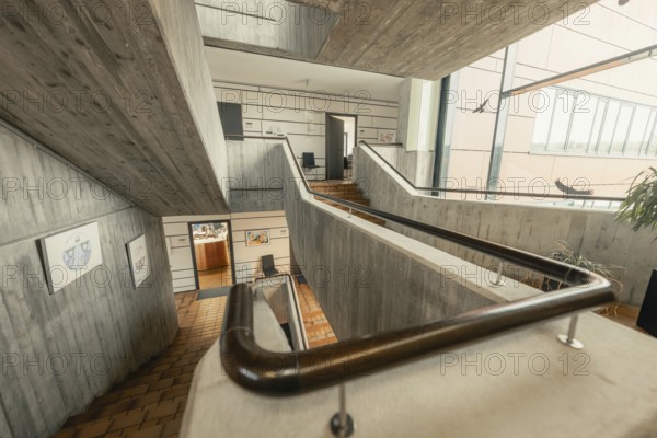 Modern staircase with concrete and wooden details, open structure and interior decoration, Gechingen Town Hall, Calw district, Germany