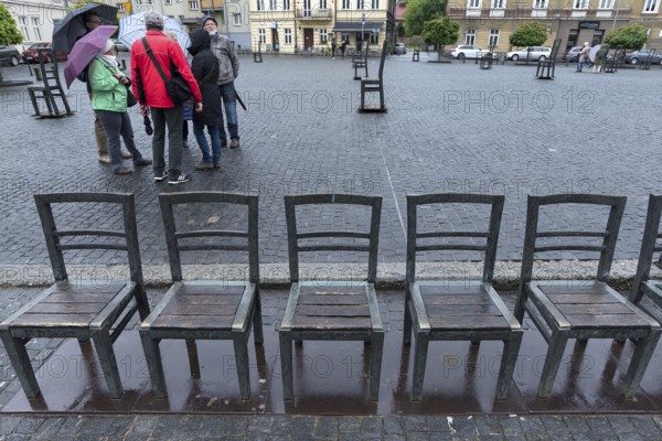 The sixty chairs memorial on the grounds of the Jewish ghetto, Krakow, Poland