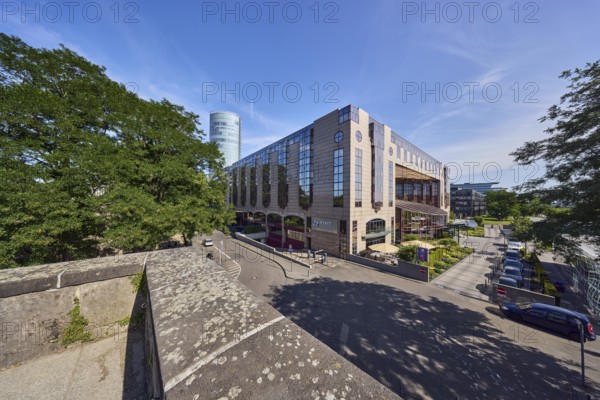 Hyatt Regency, hotel, commercial building, modern architecture, general development, sandstone wall, trees, elevated perspective, blue sky, cirrus clouds, cirrostratus clouds, Kennedy shore, Cologne, district-free city, North Rhine-Westphalia, Germany