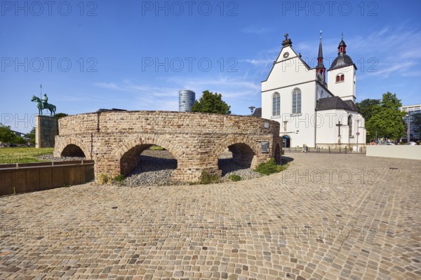 Historic railway hub, Alt St. Heribert church, equestrian statue, cobblestone walkway, lawn, trees, blue sky, cirrus clouds, Urbanstraße, Kennedy-Ufer, Cologne, district-free city, North Rhine-Westphalia, Germany