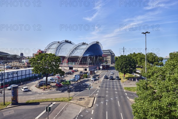 Large tent Musical Dome, general architecture, street, lantern, lanes, road markings lanes, pedestrian ford and stop line, cars, parking lot, lawn, trees, bird's-eye view, blue sky, cirrus clouds, federal road B51, Konrad-Adenauer-Ufer, Cologne, district-free city, North Rhine-Westphalia, Germany