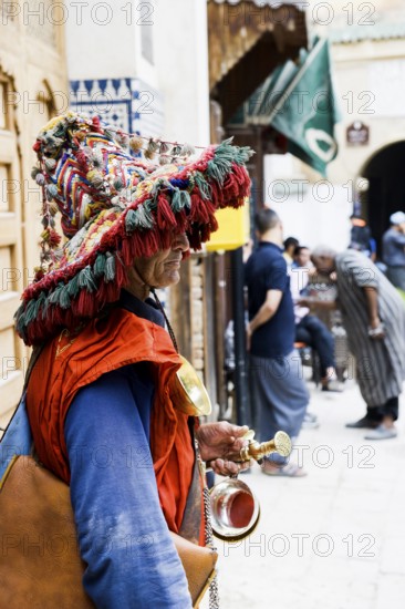 Water vendor, Souk, Fez El Bali, Medina, UNESCO World Heritage Site, Fez, Morocco