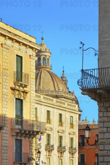 Historic centre view including the dome of Badia di Sant'Agata church, Catania, Sicily, Italy