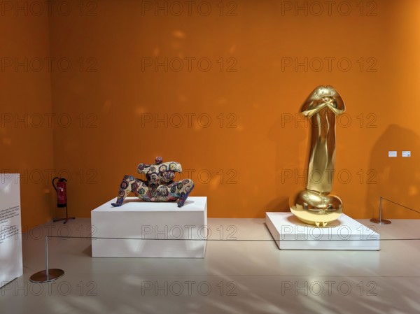 Colorful sculpture, Nana, woman, Niki de Saint Phalle and golden phallus sculpture, Japanese artist Takashi Murakami, pop art, exhibition Love you for infinity, Sprengel Museum, Hanover, Germany