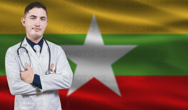Portrait of medical professional on Myanmar flag background. Burmese national health system
