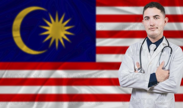 Portrait of medical professional on Malaysia flag background. Malaysian national health system