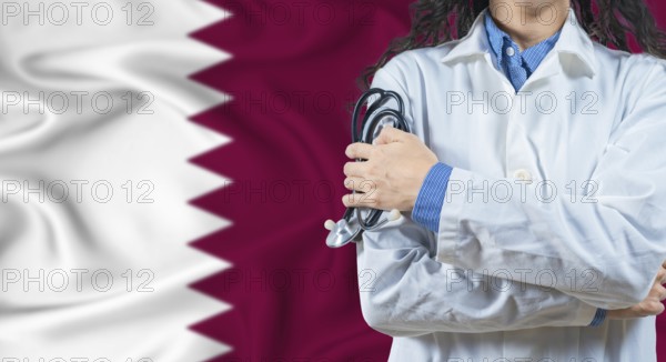 Healthcare professional with Qatar flag background. Professional doctor holding stethoscope on Qatar flag background