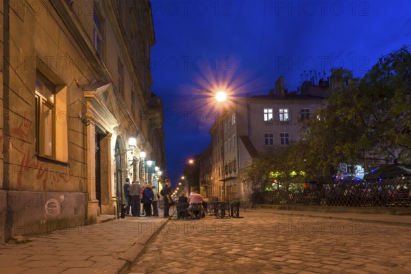 Nighttime scene in the old town district of Lviv, Ukraine