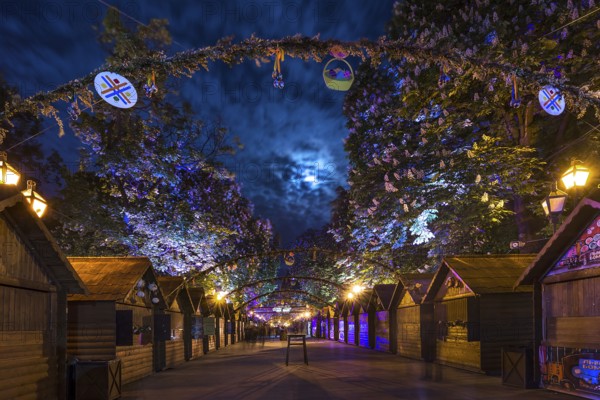 Souvenir stalls lit at night on Svobody Prospekt, Lviv, Ukraine