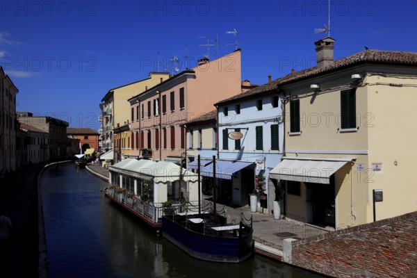 Old town with canal in the lagoon town of Comacchio in Emilia-Romagna, Ferrara province, Italy