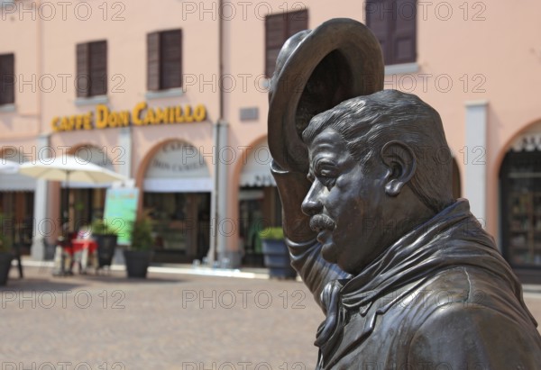 Italy, village of Brescello, bronze figure of Peppone, Mayor Giuseppe Bottazzi portrayed by actor Gino Cervi