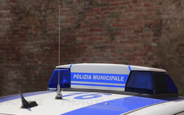 Polizia municipale, police car in Italy, marking on the roof of the car, lettering